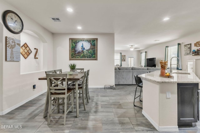 237 Gonzalo Cir, El Paso, TX 79932 - dining room with recessed lighting, arched walkways, and a ceiling fan