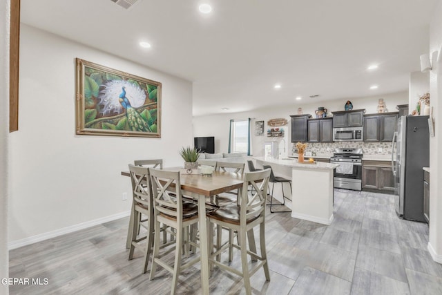 237 Gonzalo Cir, El Paso, TX 79932 - dining area featuring recessed lighting and light wood-style floors
