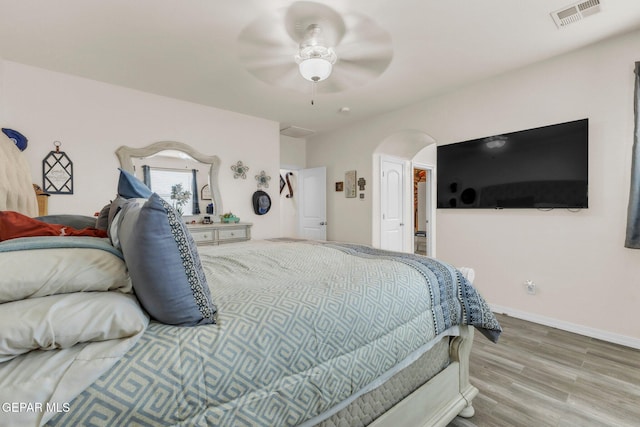 237 Gonzalo Cir, El Paso, TX 79932 - bedroom with wood finished floors, arched walkways, and ceiling fan