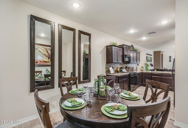 15249 Apex Ct, El Paso, TX 79938 - dining space featuring recessed lighting and light wood-style flooring