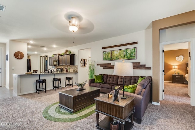 15249 Apex Ct, El Paso, TX 79938 - living area featuring carpet floors and a ceiling fan
