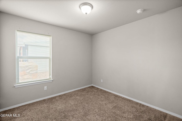 14207 Desierto Bonito St, Horizon City, TX 79928 - unfurnished room featuring a smoke detector and carpet flooring