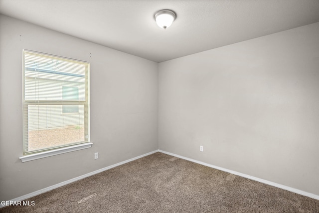 14207 Desierto Bonito St, Horizon City, TX 79928 - unfurnished room with carpet flooring and baseboards