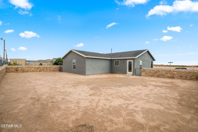 14207 Desierto Bonito St, Horizon City, TX 79928 - rear view of house with stucco siding