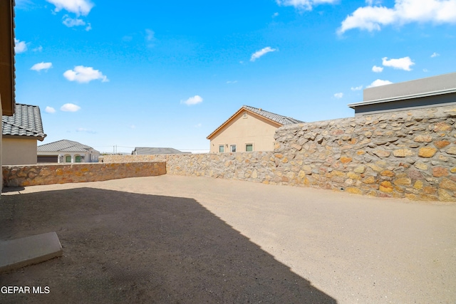245 Hunstanton St, Horizon City, TX 79928 - view of yard featuring a patio area