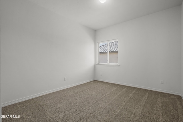 245 Hunstanton St, Horizon City, TX 79928 - spare room featuring carpet flooring and baseboards