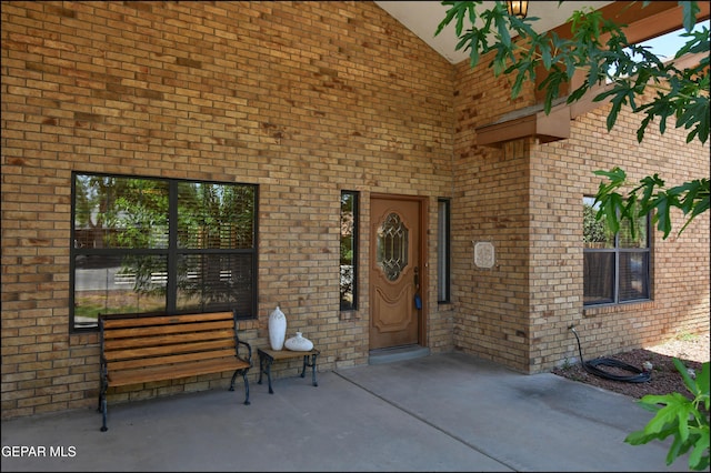 712 Rena Mae Ct, Las Cruces, NM 88005 - doorway to property featuring brick siding