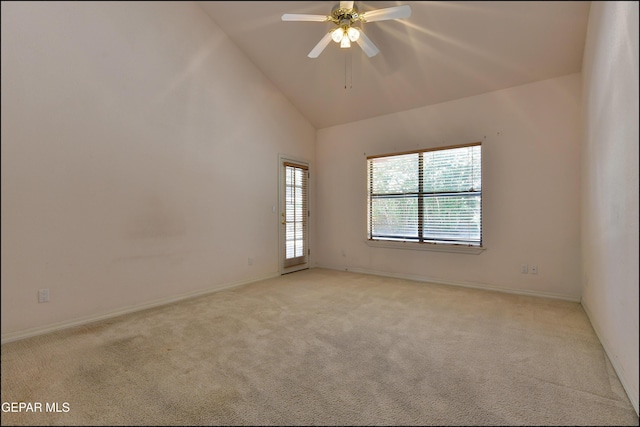712 Rena Mae Ct, Las Cruces, NM 88005 - spare room with light carpet, a ceiling fan, and high vaulted ceiling