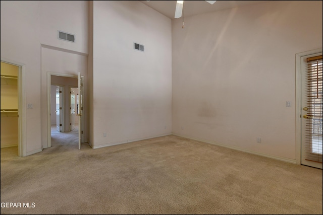 712 Rena Mae Ct, Las Cruces, NM 88005 - carpeted empty room with a high ceiling and ceiling fan
