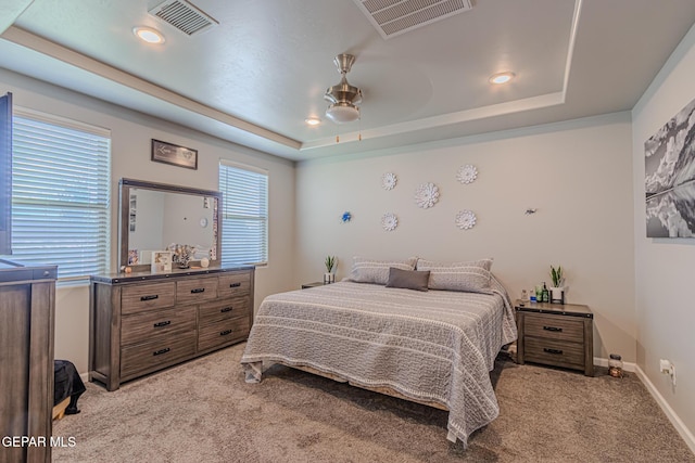13010 Aberdare Dr, El Paso, TX 79928 - bedroom with light carpet, a raised ceiling, a ceiling fan, and recessed lighting