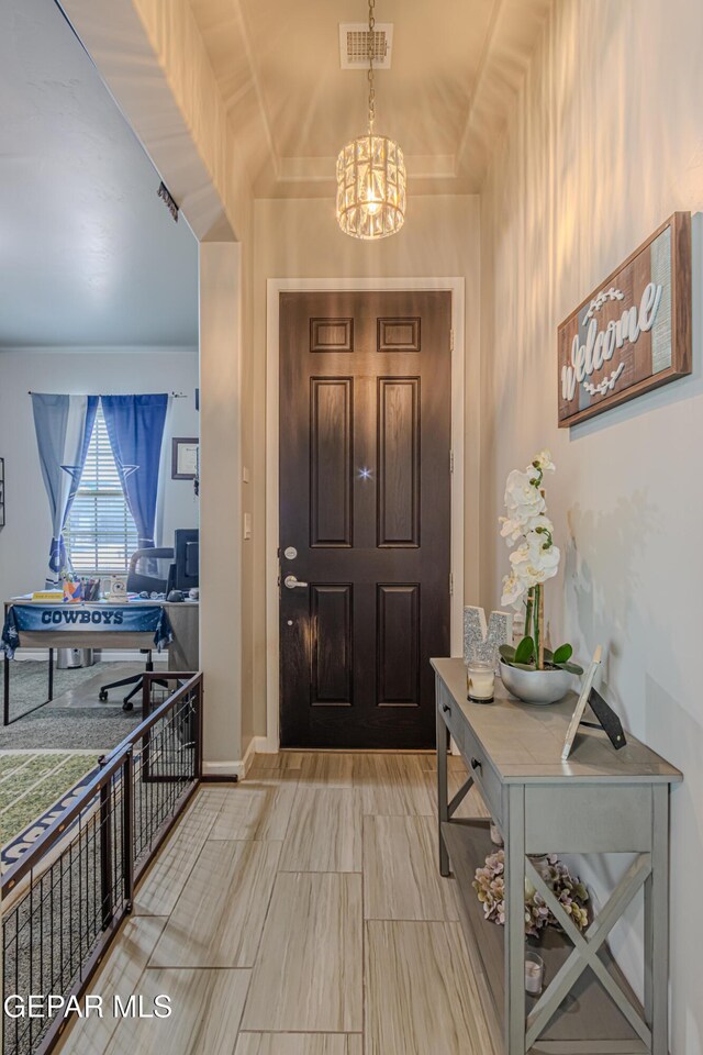 13010 Aberdare Dr, El Paso, TX 79928 - entrance foyer featuring a chandelier