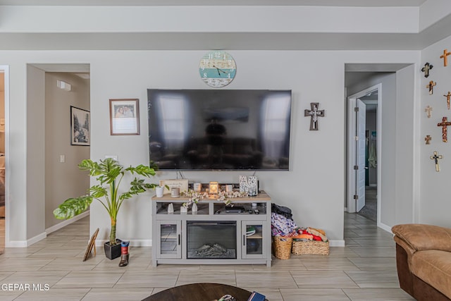 13010 Aberdare Dr, El Paso, TX 79928 - living room featuring wood tiled floors and baseboards