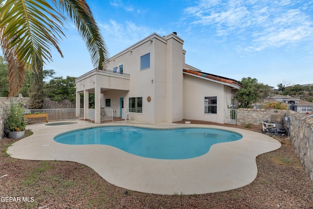 1121 Regal Ridge Dr, El Paso, TX 79912 - view of swimming pool featuring a patio area, a fenced backyard, and an in-ground hot tub