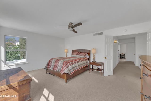 1121 Regal Ridge Dr, El Paso, TX 79912 - bedroom featuring light carpet and ceiling fan