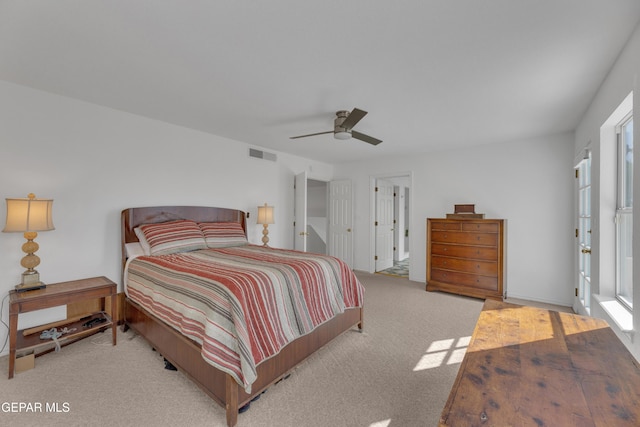1121 Regal Ridge Dr, El Paso, TX 79912 - bedroom with light carpet and ceiling fan
