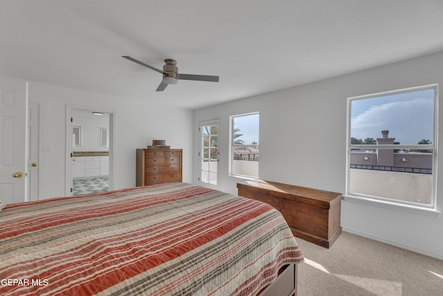 1121 Regal Ridge Dr, El Paso, TX 79912 - bedroom featuring carpet flooring, ceiling fan, and ensuite bathroom
