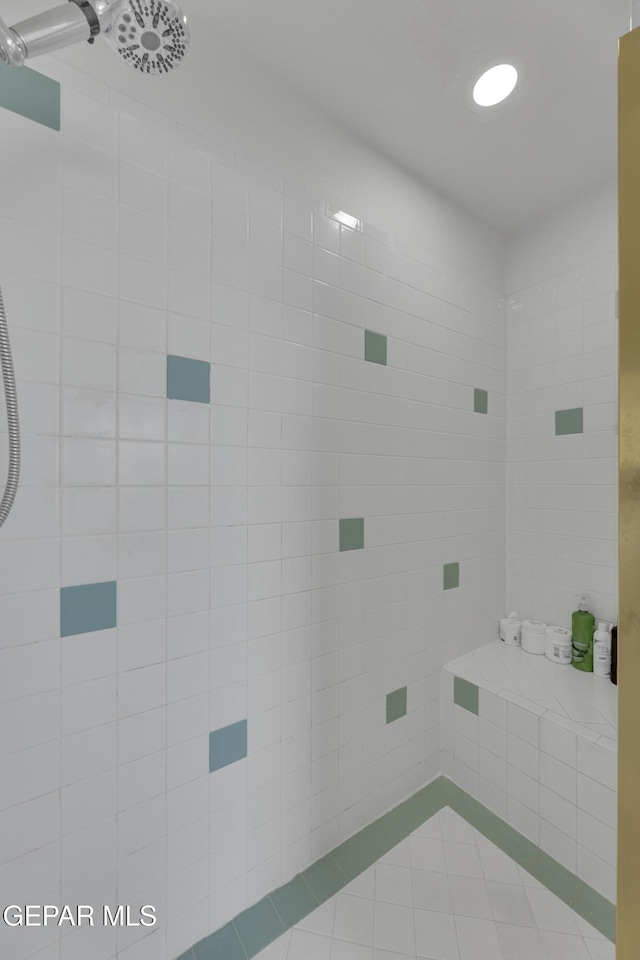 1121 Regal Ridge Dr, El Paso, TX 79912 - full bath featuring tiled shower and tile patterned flooring