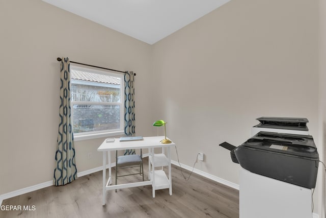 1121 Regal Ridge Dr, El Paso, TX 79912 - office area featuring wood finished floors and baseboards