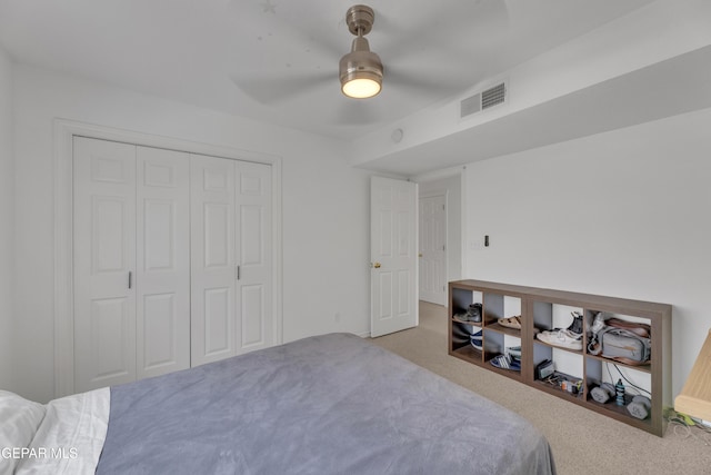 1121 Regal Ridge Dr, El Paso, TX 79912 - bedroom with carpet flooring, a closet, and a ceiling fan
