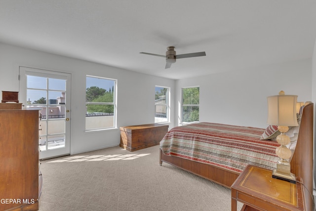 1121 Regal Ridge Dr, El Paso, TX 79912 - carpeted bedroom featuring access to exterior and a ceiling fan