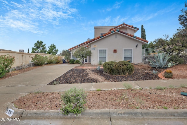 1121 Regal Ridge Dr, El Paso, TX 79912 - view of front facade featuring stucco siding and a tiled roof