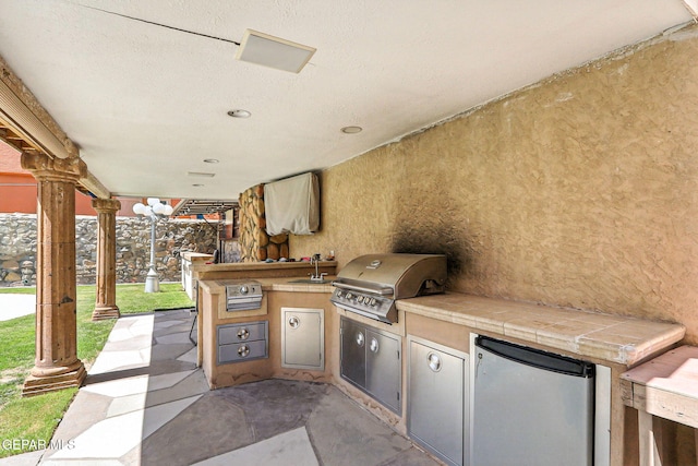 12301 Tierra Limpa Dr, El Paso, TX 79938 - view of patio featuring an outdoor kitchen and a sink