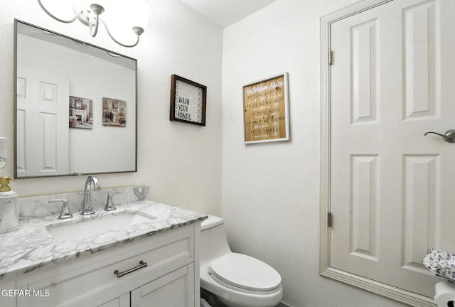 12301 Tierra Limpa Dr, El Paso, TX 79938 - half bathroom with vanity and toilet
