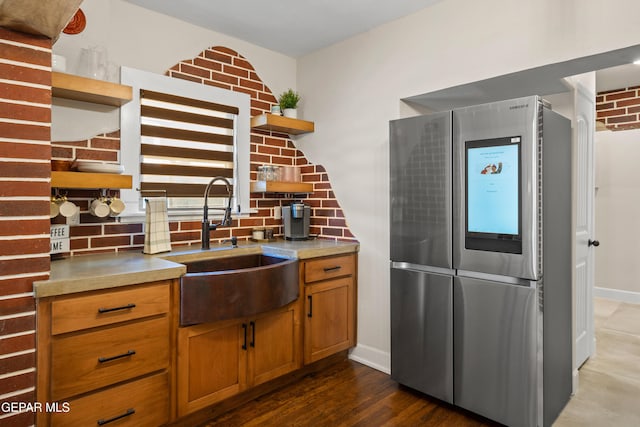 1531 E Rio Grande Ave, El Paso, TX 79902 - kitchen with open shelves, smart refrigerator, brown cabinetry, tasteful backsplash, and light countertops
