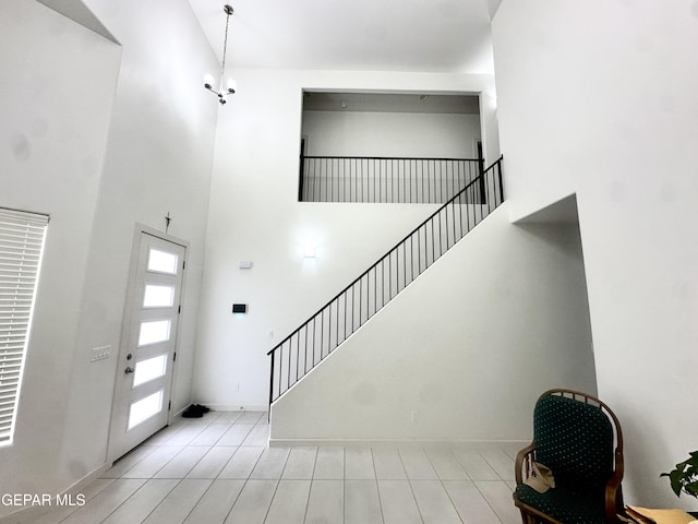 7780 Enchanted Park Dr, El Paso, TX 79911 - entryway with a towering ceiling and stairs