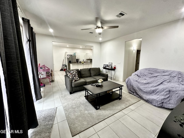7780 Enchanted Park Dr, El Paso, TX 79911 - living room featuring ceiling fan and light tile patterned floors