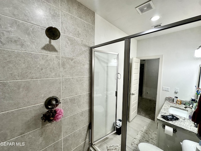 7780 Enchanted Park Dr, El Paso, TX 79911 - bathroom with a stall shower, vanity, and tile patterned floors