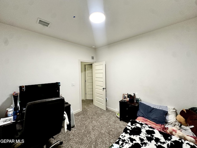 7780 Enchanted Park Dr, El Paso, TX 79911 - carpeted bedroom with an office area and baseboards
