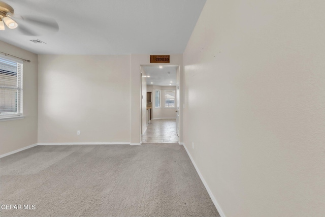 541 Sunset Valley Ave, Socorro, TX 79927 - unfurnished room featuring a ceiling fan, light carpet, and recessed lighting