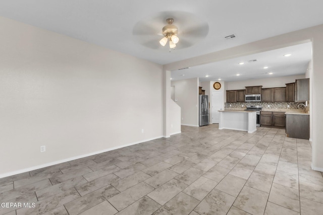 541 Sunset Valley Ave, Socorro, TX 79927 - unfurnished living room with ceiling fan and recessed lighting