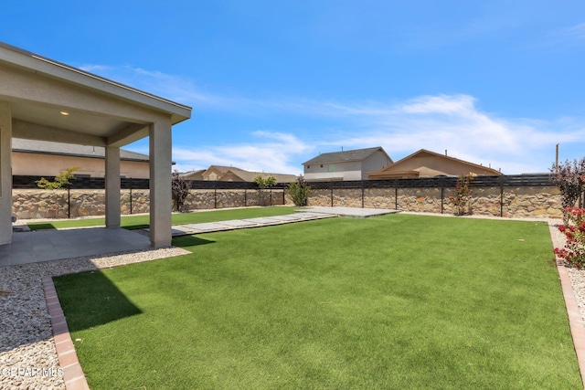 541 Sunset Valley Ave, Socorro, TX 79927 - fenced backyard with a patio