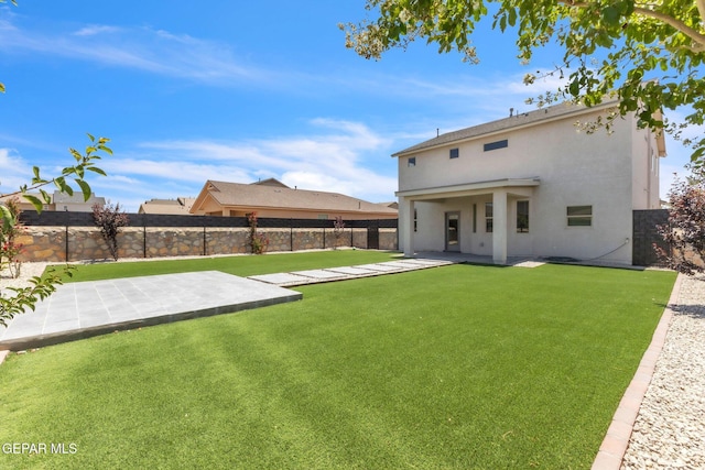 541 Sunset Valley Ave, Socorro, TX 79927 - rear view of house featuring stucco siding, a fenced backyard, and a patio