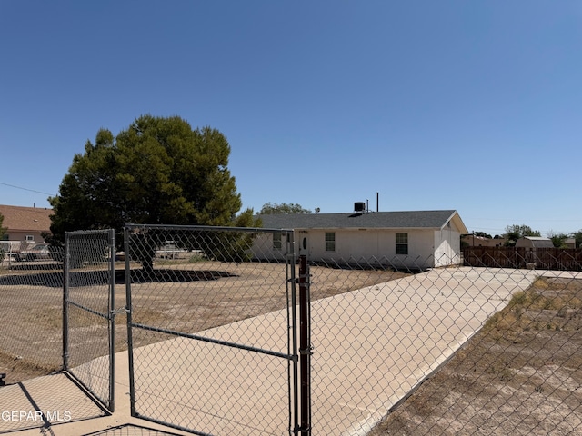 11711 Flor Del Rio St, Socorro, TX 79927 - view of front of house with a gate