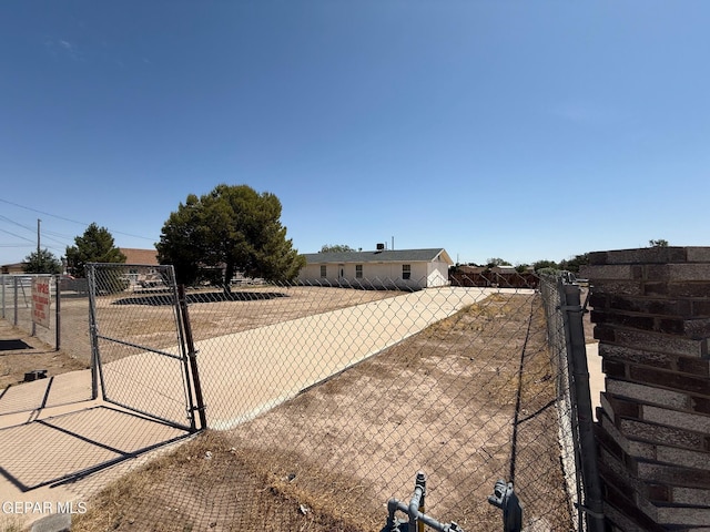 11711 Flor Del Rio St, Socorro, TX 79927 - exterior space featuring a gate and a gated entry