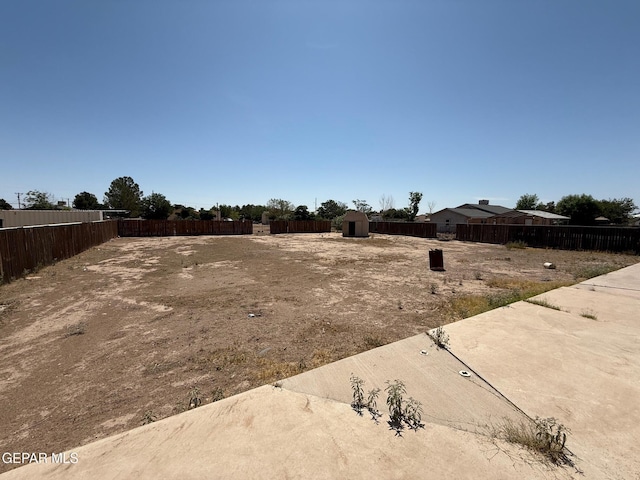 11711 Flor Del Rio St, Socorro, TX 79927 - view of yard featuring a storage shed