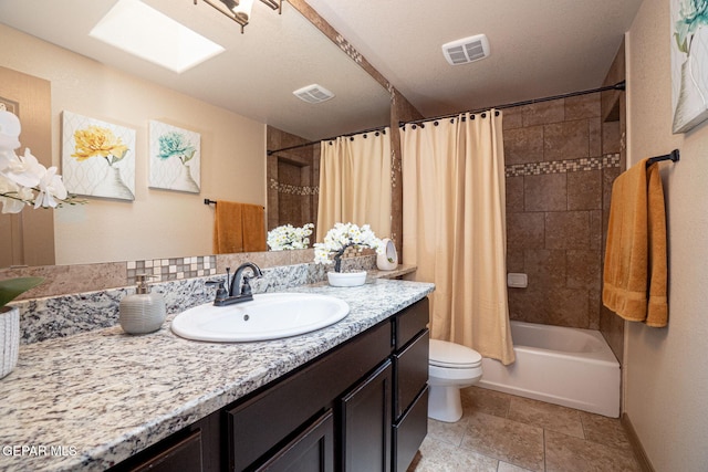 7317 Kiowa Creek Dr, El Paso, TX 79911 - bathroom featuring vanity and shower / bathtub combination with curtain