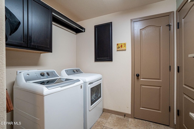 7317 Kiowa Creek Dr, El Paso, TX 79911 - laundry room with washer and clothes dryer and cabinet space