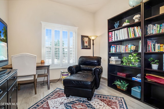 7317 Kiowa Creek Dr, El Paso, TX 79911 - living area with wood finished floors and baseboards
