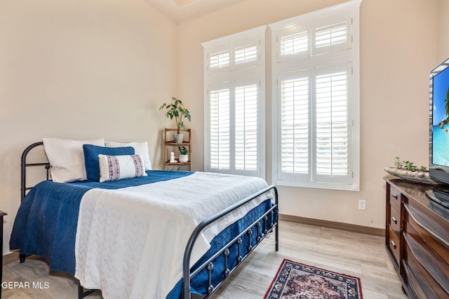 7317 Kiowa Creek Dr, El Paso, TX 79911 - bedroom with light wood-type flooring and baseboards