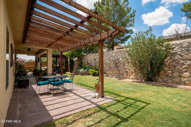 7317 Kiowa Creek Dr, El Paso, TX 79911 - fenced backyard featuring a pergola, outdoor dining space, a patio area, and ceiling fan