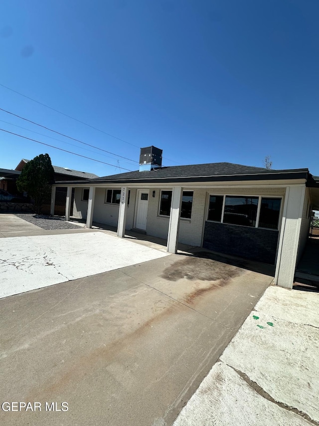 7216 Amethyst Rd, El Paso, TX 79915 - ranch-style home with a patio area and roof with shingles