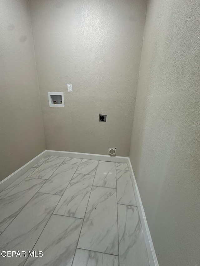 7216 Amethyst Rd, El Paso, TX 79915 - laundry room with washer hookup, marble look tiles, and electric dryer hookup