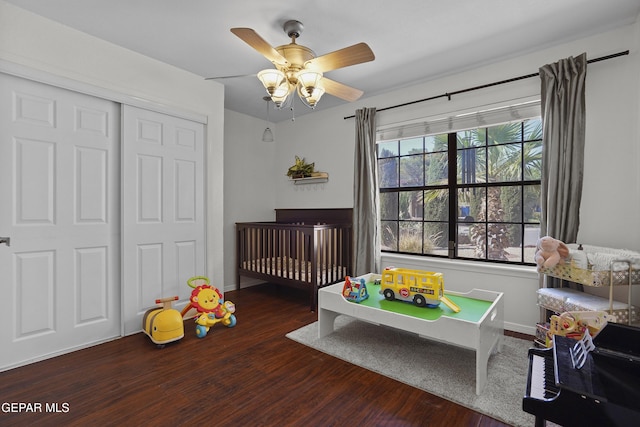 608 Paseo De Luna Ln, El Paso, TX 79912 - bedroom with wood finished floors, a closet, a nursery area, and ceiling fan