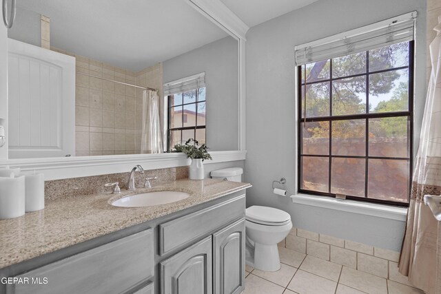 608 Paseo De Luna Ln, El Paso, TX 79912 - bathroom featuring vanity, tile patterned floors, and a shower with curtain