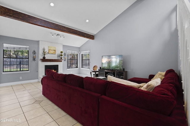 608 Paseo De Luna Ln, El Paso, TX 79912 - living area featuring plenty of natural light, light tile patterned floors, and a brick fireplace