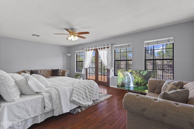 608 Paseo De Luna Ln, El Paso, TX 79912 - bedroom featuring wood finished floors, ceiling fan, and access to outside